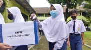 Dengan menyisihkan uang saku, ratusan siswa di SMPN 6 Temanggung, Jawa Tengah, melakukan penggalangan dana untuk korban erupsi Gunung Semeru di Lumajang, Jawa Timur. (Foto: MC.TMG)