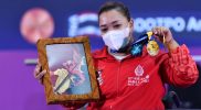 Shebrioni meraih medali emas sekaligus memecahkan rekor angkatan terbaik kelas 67 kilogram di ASEAN Paragames 2022 di Solo. Foto: Amiriyandi/ InfoPublik